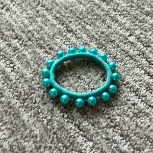 Bright blue hair tie